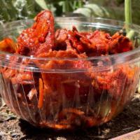 Loco Carrot Munchies Chili Chips · Carrot baked chips with chili powder. Prepared with healthy chamoy, cucumber, shredded jicam...