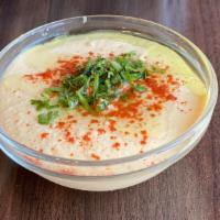 Hummus · Chickpeas, tahini, olive oil and traditional spices.