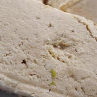 Halva · Dessert common in Middle Eastern countries. Made of sesame seed and sugar paste mixed with p...