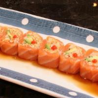 Dam Jumper · Hot. Spicy krab, avocado and cucumber rolled in fresh salmon, topped with a touch of srirach...