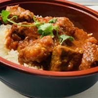 Curry Bowl  · Over jasmine rice garnish with cilantro.