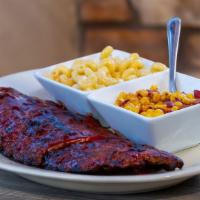 Baby Back Ribs · Slow Roasted Baby Back Ribs, Famous Mac & Cheese, F48 Corn.