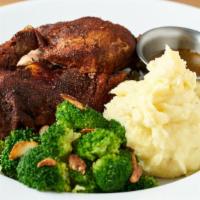 Half Roasted Chicken · Roasted Chicken, Whipped Yukon Gold Mashed Potatoes, Garlic Broccoli, Chicken Jus.