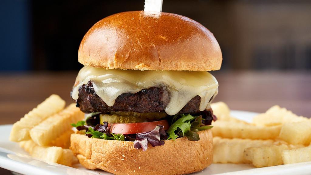 Famous Burger · Ground Chuck, Lettuce, Tomato, White Cheddar, Bacon, Dill Pickles, Brioche Bun.