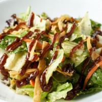 Asian Chicken Salad · Mixed Greens, Cilantro, Carrots, Tortilla Strips, Peanut Sauce, Green Onions, Honey Lime Vin...