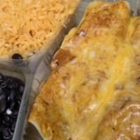 Enchiladas De Camarã³N · Two corn tortillas filled with shrimp. Topped with special sauce and melted cheese. Garnishe...