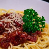 Spaghetti Marinara · Spaghetti topped off with our home-made marinara sauce and parmesan. Be sure to add our famo...