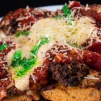 Meatball · Home-made meatballs, mozzarella cheese, marinara sauce, and Parmesan served on our specialty...