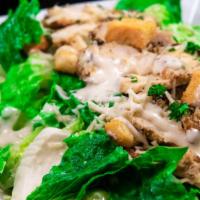 Caesar Salad · Romaine lettuce, croutons, and parmesan cheese.
