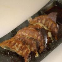 Pan-Fried Gyoza (6Pcs) · Japanese pan-fried pork dumpling.