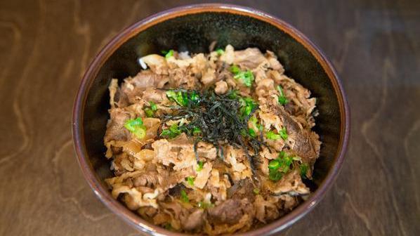 Sukiyaki Beef Bowl · Japanese style pan fried beef over rice.