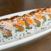 Rainier · Spicy tuna, crab mix, cucumber. Topped with seared salmon, unagi sauce, spicy aioli