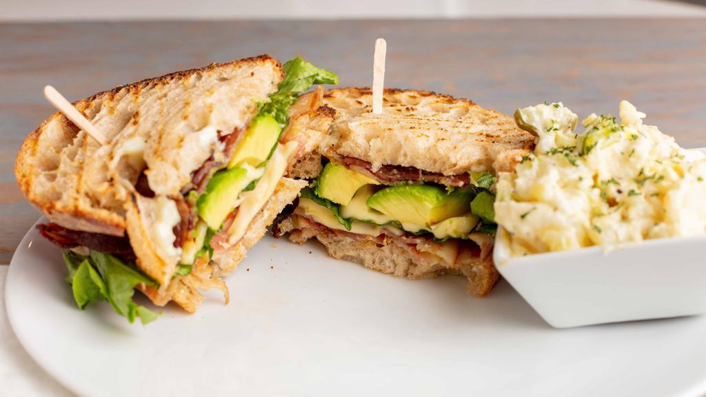 Ultimate Blt · Smoked bacon, avocado, tomato, aged swiss cheese & romaine with mayonnaise on country bread.