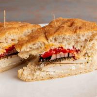 Chicken, Red Pepper & Goat Cheese · Grilled herb chicken, red onion & roasted red pepper on focaccia with balsamic dressing & go...
