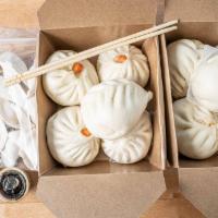 Combo Bag- Flash Frozen Bao & Dumplings · 10 assorted flash frozen bao and a bag of 15 piece dumplings. Includes dumpling sauce and ch...