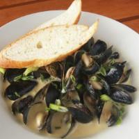 Coconut Curry Mussels · Penn cove mussels, yellow curry, basil, green onion, bread. Gluten free without the bread.