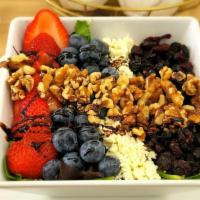 Greens & Berries · Mixed greens, strawberries, blueberries, walnuts, cranberries, feta cheese, and balsamic vin...