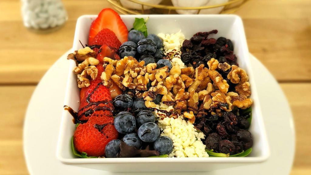 Greens & Berries · Mixed greens, strawberries, blueberries, walnuts, cranberries, feta cheese, and balsamic vinaigrette.