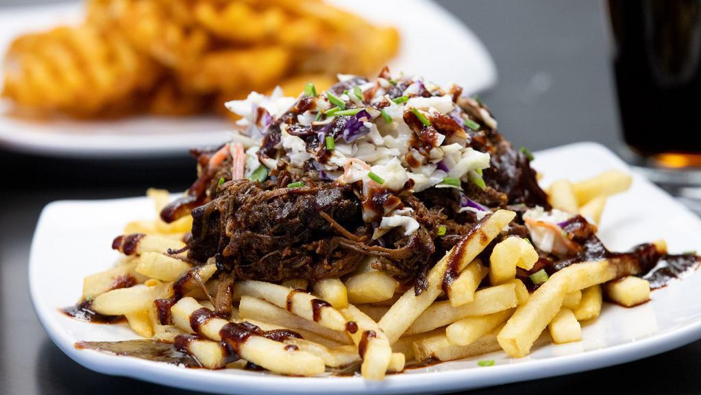 Smoked Brisket Fries · with coleslaw and BBQ sauce.