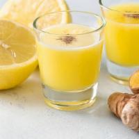 Ginger & Turmeric Shot · Fresh squeezed orange and lemon juice with fresh ground Ginger and turmeric with black pepper.