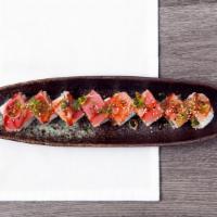 Diablo Roll · Spicy. Tuna, jalapeño topped with seared peppered tuna, habanero and unagi sauce, scallions ...