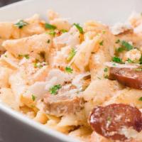 Family Spicy Born On The Bayou Pasta · Blackened shrimp, hot Italian sausage, chicken, Andouille sausage, garlic, parsley, roasted ...