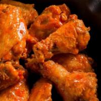 The Rock Wings · Skillet baked and tossed with your choice of ranch season dry rub, hot sauce, sweet red chil...