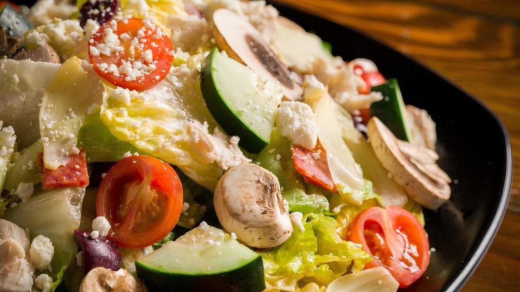 Mediterranean Salad · Grilled chicken, romaine lettuce, Kalamata olives, cucumbers, red onions, artichoke hearts, sliced mushrooms, tomatoes, pepperoni, Feta cheese, Italian dressing