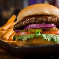 The Rock · All beef patty, red onion, tomato, lettuce, pickles.   Served with Beer Battered Fries