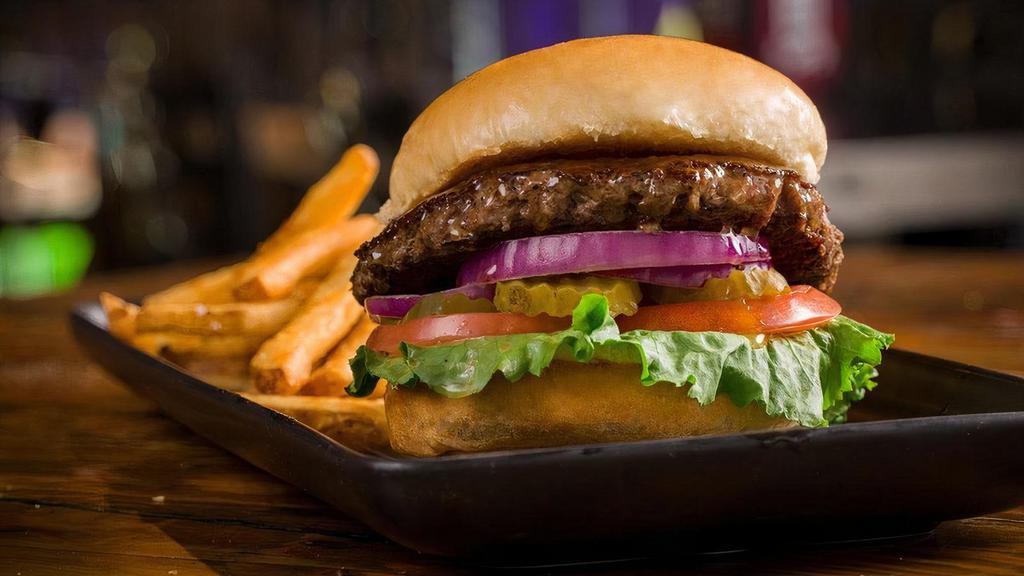 The Rock · All beef patty, red onion, tomato, lettuce, pickles.   Served with Beer Battered Fries