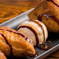 Rock House Made Doughnuts · 4 Rock House Made Churro Style Doughnuts, deep fried until Golden Brown then dusted with Cin...