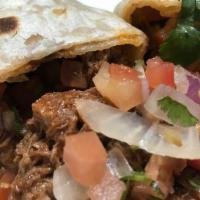 Barbacoa Burrito · Shredded beef marinated on a special Jalisco style sauce and pico de gallo.