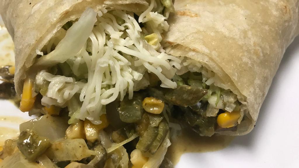Rajas Con Crema Burrito · Sliced poblano peppers cooked with butter, sour cream, corn and onions. Lettuce and cheese.