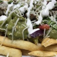 Pueblito Fries · French fries, cheese, meat, pico de gallo, and sour cream.