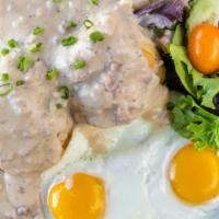 *Biscuits & Gravy · Two buttermilk biscuits, country sausage gravy, two farm eggs, mixed greens.