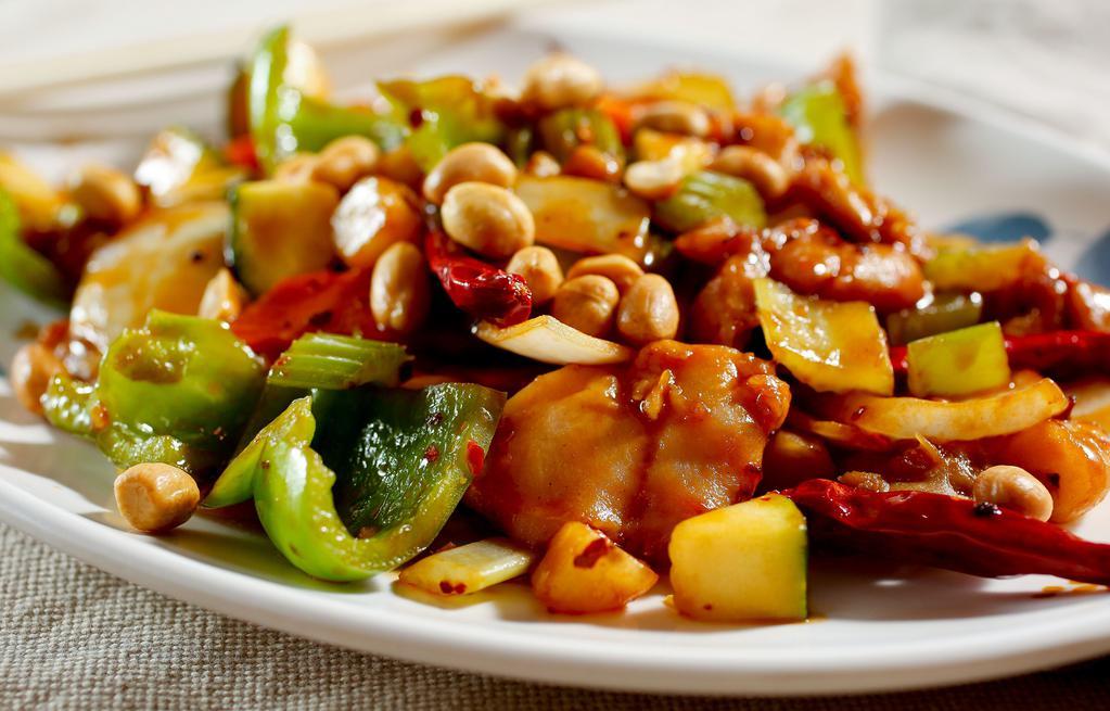 Kung Pao Chicken 宫保鸡 · Spicy. Chicken diced and sautéed with diced chili peppers, celery, bell pepper, yellow onions, water chestnuts, peanuts and spicy sauce. Hot and spicy.
