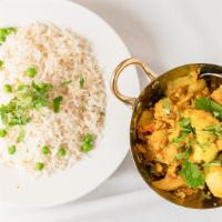 Aloo Gobi · Fresh cauliflower and potatoes sautéed with garlic, onions, tomatoes, and spices.