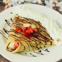 Strawberry & Nutella Crepe · This customer favorite is one of our most popular options. Fresh, chopped strawberries with ...