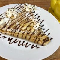 Banana & Nutella Crepe · This customer favorite is full of nutella and bananas, topped with a chocolate sauce.