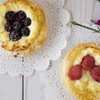 Fruit Plyushka · Round puff pastry filled with sweet farmers cheese and berries: Strawberry, Raspberry or Blu...