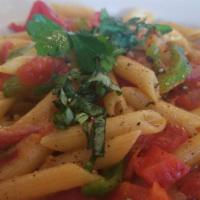 Penne Alle Vodka · Italian sausage blended with red & green bell peppers, red onions, and penne pasta in a spic...