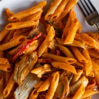 Arrezio · Penne pasta sautéed with red and green bell peppers, red onions, artichoke hearts, and garli...