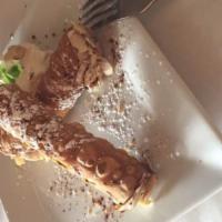 ￼Cannoli · A traditional sicilian dessert made with a 