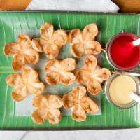 Crab Rangoon · Imitation crab meat and cream cheese wrapped in wonton skin, deep fried, served with sweet a...