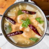 Shrimp Lemongrass Soup “Tom Yum Goong” · Spicy clear broth with shrimp, lemongrass, mushrooms and other traditional Thai spices.