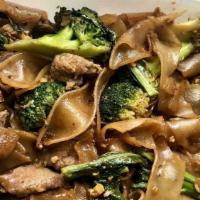 Pad See Ewe · Rice noodles topped with beef, chicken or pork, stir-fried with egg and broccoli.
