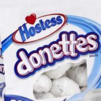 Hostess Donettes Powdered Bag 10.5 Oz · Round and round they go, right into your heart. Get a sweet start with hostess Donettes. The...