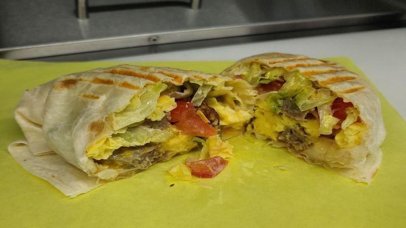 Breakfast Burrito · egg sausage tomatoes  cheese on a tortilla and grilled
