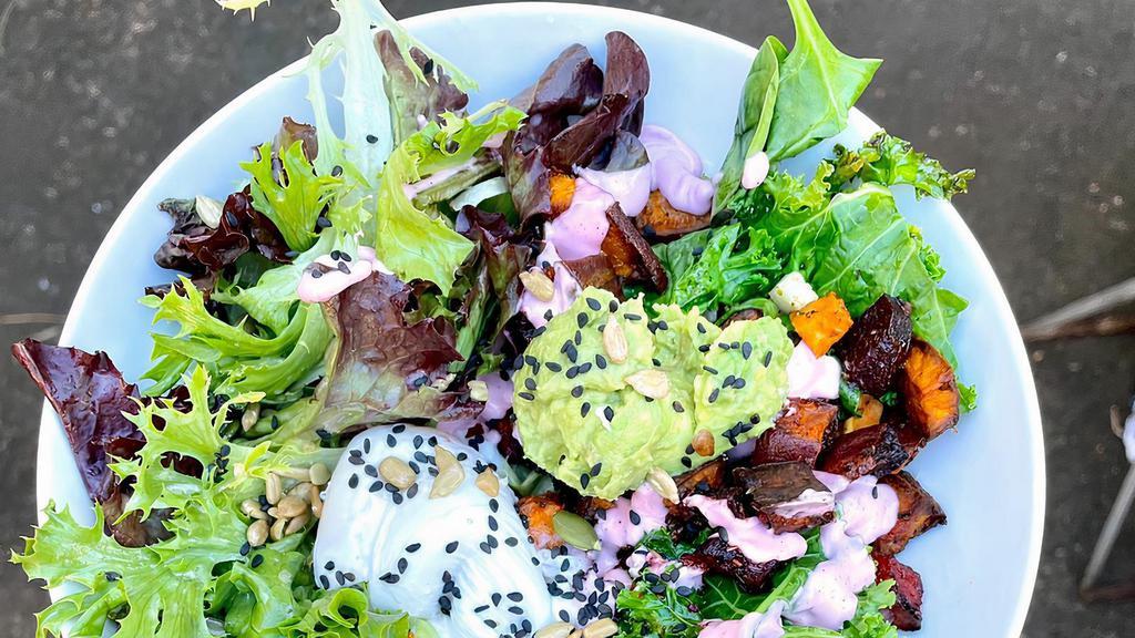 Brunch Bowl · Roasted sweet potato + beets with shallots, poached egg,  spinach, kale, mashed avocado, dressed spring greens, seed mix, pink garlic tahini. Add on proteins available or option to make it Vegan