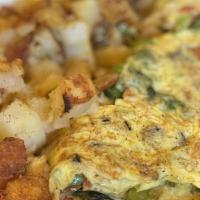 Build An Omelette · Choose any three items. Served with home fries and choice of toast. Add extras for an additi...